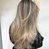 Inverted layered haircuts for long straight hair. 1