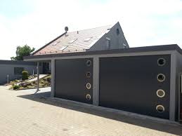 Stahl Doppelgarage Mit Sektionaltoren Gerateraum Hinten Integriert Carport Anbau News Brandl