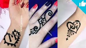 The letter k serif with arm and leg which forms an organic symbol of love. Free M Tattoo Mehndi Design Watch Online Khatrimaza