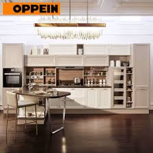 Adding art that fits your space and style is a simple but effective way to amp up your kitchen design. China Oppein Compact Kitchenette Built In Design Fitted Kitchen Cabinets China Fitted Kitchen Cabinets Built In Kitchen Cabinet