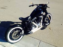 Softail Slim With Custom Rear Fender Wide Solo Saddle Seat And Springer Kit Softail Slim Retro Motorcycle Harley Softail