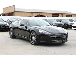 Image result for Jet Black 2011 Aston Martin