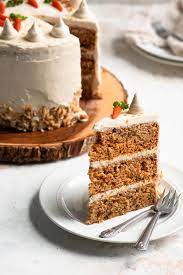 Tender carrot cake full of cozy spices & topped with sweet cream cheese frosting. Easy Vegan Carrot Cake The Curious Chickpea