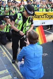 Law enforcement officers in the french capital used tear gas and water cannon to disperse the crowds as the situation on the streets spiraled out of control elsewhere in paris, a tense standoff between officers in riot gear and demonstrators ended up in a brief but fierce scuffle that prompted the police. Watch The Beautiful Moment A Woman Proposed To Her Police Officer Girlfriend At London Pride