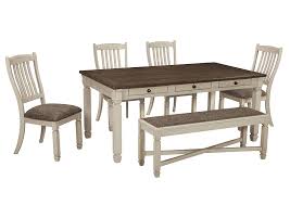 This dining room table features storage at the base with 3 shelves and cubby hole. Bolanburg Antique White Rectangular Dining Room Table W Bench And 4 Upholstered Side Chairs Furniture Merchandise Outlet