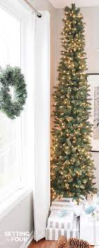 Place them all around the house for maximum holiday when it's time to think about your holiday decorating , it's no surprise most people start with the tree. A Pencil Christmas Tree Style For Narrow Spaces Setting For Four