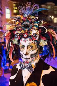 Halloween make up halloween costumes halloween havoc halloween scene halloween ideas sugar skull makeup sugar skulls candy skulls dead makeup. Man With Sugar Skull Makeup Large Feather Headdress Dia De Los Muertos