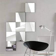 Different sized square mirror tiles with bevels can be made into a stunning mirror mosaic. 28 Unique And Stunning Wall Mirror Designs For Living Room Modern Mirror Wall Mirror Wall Decor Mirror Design Wall