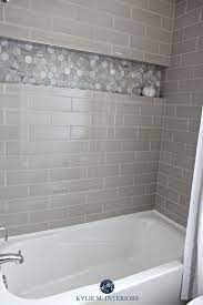 Bathroom With Bathtub And Gray Subway Tile Shower Surround With Niche Or Alcove In Hexagon Marble Tile Small Bathroom Remodel Bathrooms Remodel Hall Bathroom