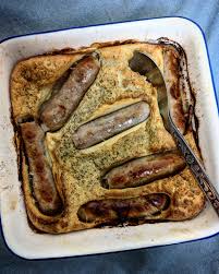Pour 2 tbsp oil in a 28 x 23cm roasting tin (or a tin roughly that size), coat the sausages in the oil and roast. Toad In The Hole 18p Jack Monroe