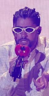 BAD BUNNY 💛 VADA #badbunnypr #badbunny #sunglasses #wrestlemania #coa...