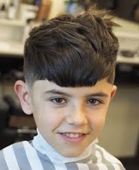 Long top layers are swept to one side and tucked behind the ear, creating a rock 'n roll vibe. 90 Cool Haircuts For Kids For 2021