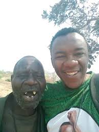 Eyes black as coal and when he lifts his face every ear in the place is