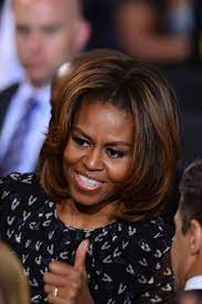 Michelle Obama Changed Up Her Hair Again And We Approve Michelle Obama Hairstyles Hair Color For Brown Skin Hair Highlights