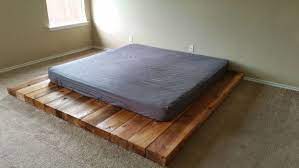 the low wooden platform bed would be ideal for use within an attic or loft space where ceiling height is low wooden bed frame wooden platform bed low bed frame
