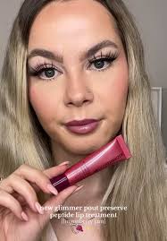 New ✨glimmer✨pout preserve lip treatment from @Olehenriksen shade  lingonberry jam 🍇 such a pretty grape shade! This is one of my favorite  lip balm formulas to exist!! #liptreatment #lipswatch ...