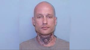 Manhunt expanded for felon in Carolina wilderness