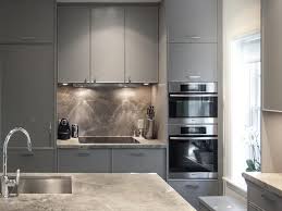 Modern kitchen cabinets, for example, are often defined by a sleek, angular and simple design, featuring little or no hardware, flush doors and flat surfaces. Gray Flat Front Kitchen Cabinets Contemporary Kitchen Flat Front Kitchen Cabinets Contemporary Kitchen Contemporary Grey Kitchen