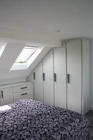 A loft bed is a bed raised, as on supports, high enough overhead to allow the use of the floor area below for various purposes. Built In Furniture For Loft Conversions Angled Ceilings Bespoke Fitted Furniture By Design