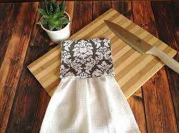 They are traditional fridge towels, with velcro instead of working buttons. see allitem description. Easy Hanging Kitchen Towel Pattern Sew Crafty Me