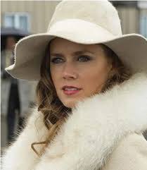 American Hustle' a portrait of swank '70s fashion