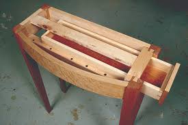 Glue is applied between the wood strips and then they are clamped in a form that matches the shape of the final curve. Bow Front Entry Table Popular Woodworking Magazine