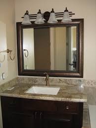 I had intended to hang the empty frame over my bathroom mirror (so mirror would extend beyond the frame), but was surprised and pleased when it turned out to be a standard bathroom mirror size and we could mount the mirror right inside it. Beautiful And Elegant Mirror Frame Kits Traditional Bathroom Salt Lake City By Reflected Design Frames For Existing Mirrors Houzz
