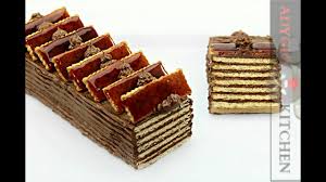 200g faina, 400 ml lapte, 2 linguri zahar, 1 sticluta esenta de rom, 1 plic zahar vanilat, 4 oua, 100 ml lapte, 200g frisca, 1 lingura esenta de rom, 50g zahar, 2 oua, 100g ciocolata. Tort Dobos Fara Coacere Reteta Cu Biscuiti Si Crema Dobos Adygio Kitchen