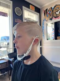 Can anyone recommend a good barbers for teen boys?