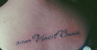 See more ideas about tattoos, small tattoos, tiny tattoos. Upper Back Tattoo Saying Amor Vincit Omnia On Helen