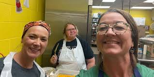 Grandma Judy': Washburn school cook honored for four decades of serving  students