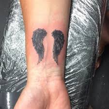 But since the use of semicolons is rare in writing, it may seem a bit odd to get a tattoo of a punctuation mark. Angel Wing Wrist Semicolon Tattoo Novocom Top