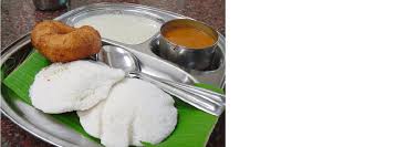 the men selling idli and vada with chutney before you travel the men selling idli and vada with