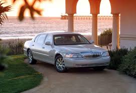 Image result for Light Ice Blue 2009 Town Car