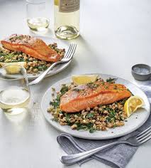 Succulent spring onions, cooked with the fish until they're caramelized, are a textural counterpoint. Fresh Flavorful Easter Main Dishes Seafood Dinner Salmon Dishes Easy Seafood Recipes