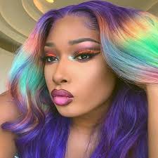 Megan thee stallion's natural hair is on point and her curls are poppin'. Megan Thee Stallion Rainbow Hair Color Popsugar Beauty