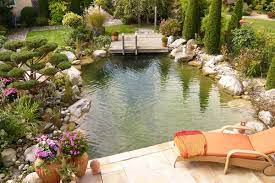 Ich habe in meinem garten einen französischen flieder. Toskana Garten Mit Schwimmteich In Stockdorf Peter Berghald Gartendesign