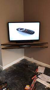 Corner mounting a tv without buying the fancy mount. Corner Tv Shelf Made From Oak Corner Tv Corner Tv Shelves Tv Shelf