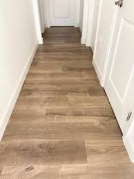 The most dent resistant waterproof vinyl floor on the market! Pergo Timbercraft Wetprotect Waterproof Wheaton Oak 7 48 In W X 54 33 In L Waterproof Embossed Wood Plank Laminate Flooring 16 93 Sq Ft Lowes Com Flooring Laminate Flooring Waterproof Wood Floor
