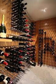 This Is Another Nek Rite Storage System From Vin De Garde Used In A Warmer Modern Setting Using Wood Surroun Wine Cellar Design Wine Wall Custom Wine Cellars