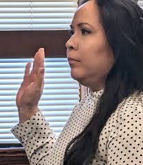 Polson woman admits to pointing gun at spouse