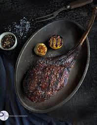 Tomahawk Steak On A Plate Steak Plates Food Good Eats