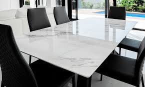 The 'x' style base of the table takes the design of this table to the next level. Marble Dining Table Set Designs For Your Home Design Cafe