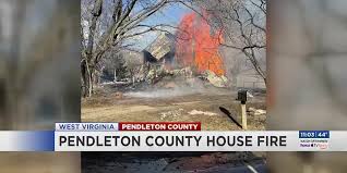 West Virginia fire engulfs house, injures one