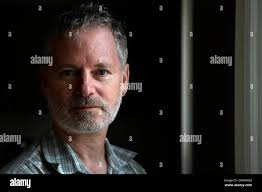 Dr. Nathaniel Katz, a former adviser to the Food and Drug Administration,  and currently CEO of Analgesic Solutions, stands for a photograph at the  company's offices in Natick, Mass.,