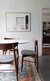 White Tulip Table With Wood Mid Century Modern Chairs Home Decor New Artwork For Spring House Of Hipsters T Home Decor Modern Dining Room Interior Design