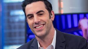 Sacha baron cohen reportedly donates to the church attended by one of borat 2's unwitting stars. Sacha Baron Cohen Crashes Right Wing Olympia Rally With Epic Prank Komo