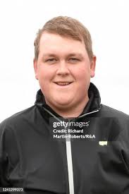 Harvey Byers of Walton Heath tees off