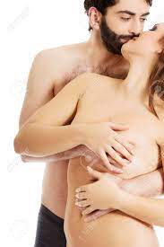 Handsome Man Touching Woman's Breast And Kissing Her. Stock Photo, Picture  and Royalty Free Image. Image 50117765.
