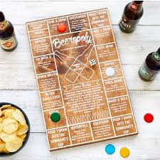Beeropoly A Game In Which You Roll The Die And Let Your Beer Cap Guide You Across The Challenge Filled Board Gifts For Beer Lovers Beer Gifts Beer Games